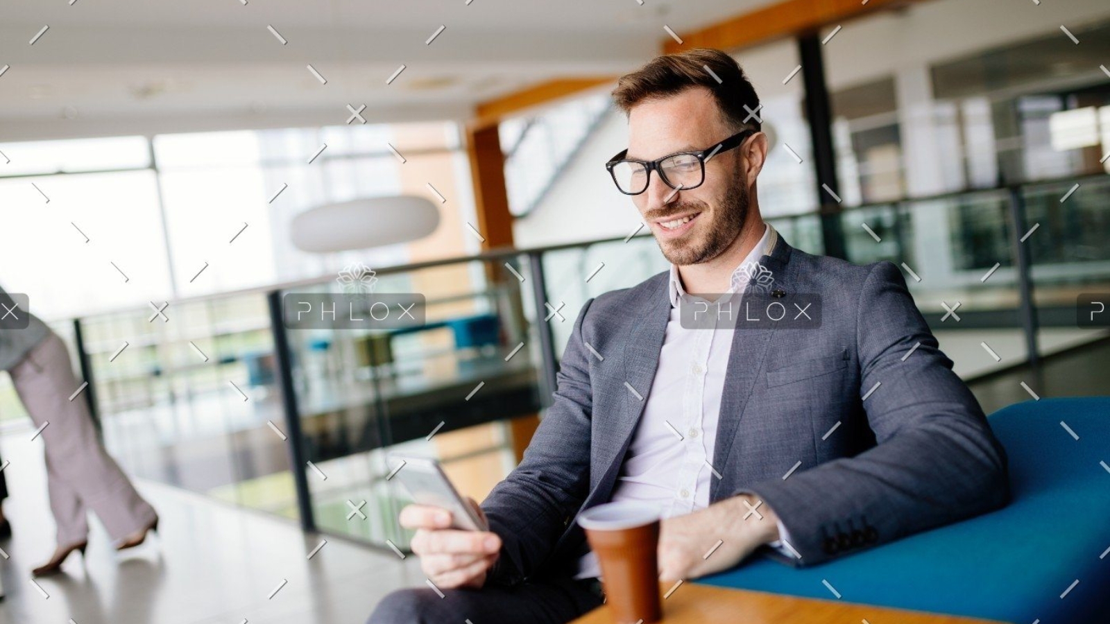 demo-attachment-1475-businessman-taking-a-break-with-a-cup-of-coffee-JW4B3DH